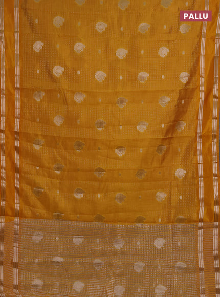 Semi raw silk saree mustard yellow with allover zari weaves and rettapet zari woven border