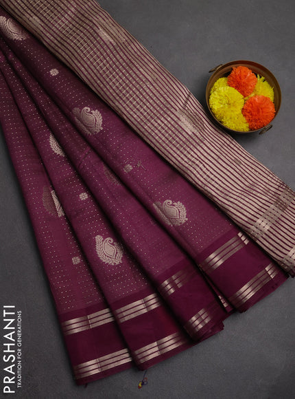 Semi raw silk saree deep wine with allover zari weaves and rettapet zari woven border