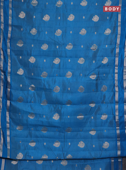 Semi raw silk saree cs blue with allover zari weaves and rettapet zari woven border