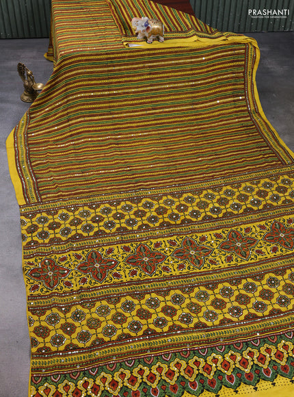 Modal silk saree yellow with allover ajrakh prints & sequin work and sequin embroidery pallu