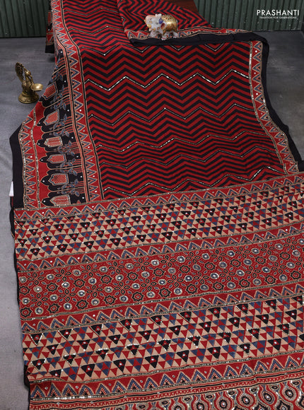 Modal silk saree maroon and black with allover zigzag prints & sequin mirror work and sequin embroidery pallu