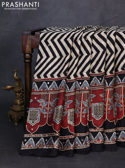 Modal silk saree beige and black with allover zigzag prints & sequin mirror work and sequin embroidery pallu