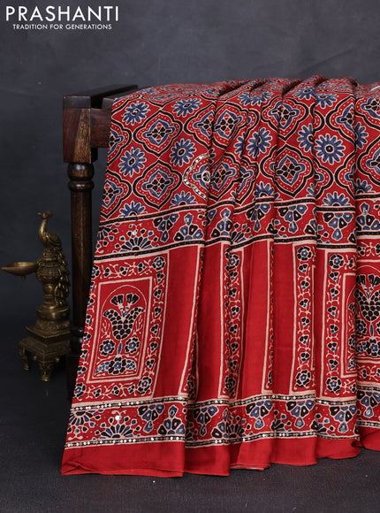 Modal silk saree rust shade with allover ajrakh prints & sequin mirror work and sequin embroidery pallu