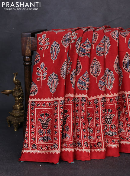 Modal silk saree rust shade with allover ajrakh prints & sequin mirror work and sequin embroidery pallu