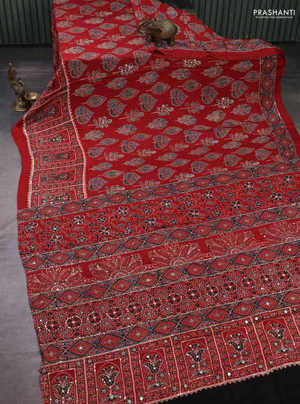 Modal silk saree rust shade with allover ajrakh prints & sequin mirror work and sequin embroidery pallu