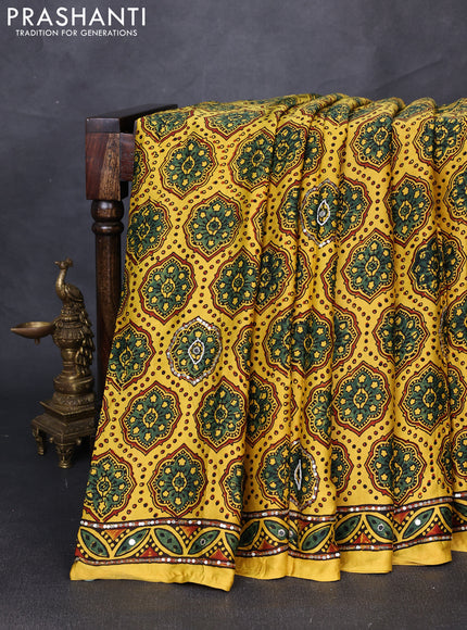 Modal silk saree yellow with allover ajrakh prints & sequin mirror work and sequin embroidery pallu
