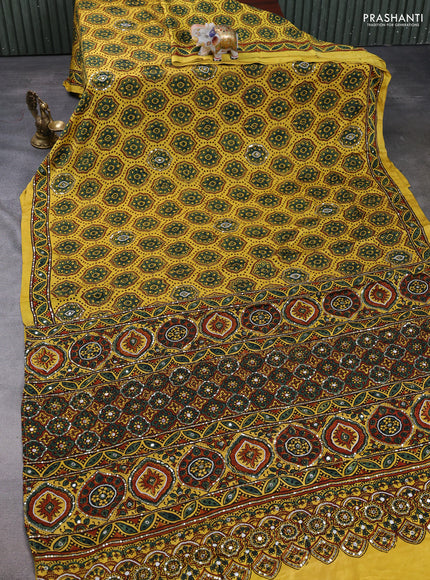 Modal silk saree yellow with allover ajrakh prints & sequin mirror work and sequin embroidery pallu