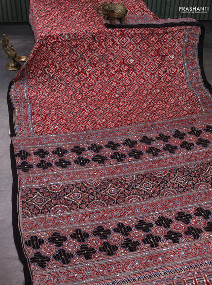Modal silk saree maroon and black with allover ajrakh prints & sequin mirror work and sequin embroidery pallu