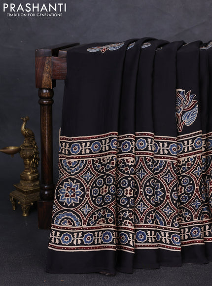 Modal silk saree black with allover ajrakh prints and printed border