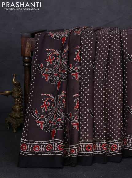 Modal silk saree rosy brown and black with allover ajrakh prints and printed border