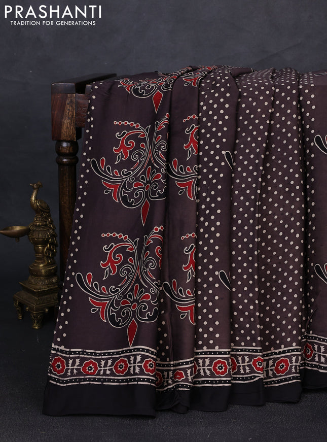 Modal silk saree rosy brown and black with allover ajrakh prints and printed border