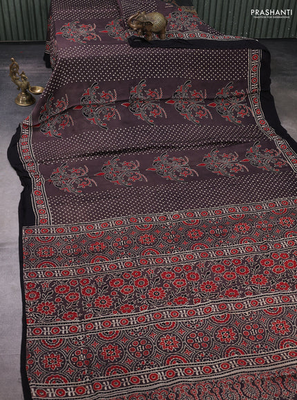 Modal silk saree rosy brown and black with allover ajrakh prints and printed border