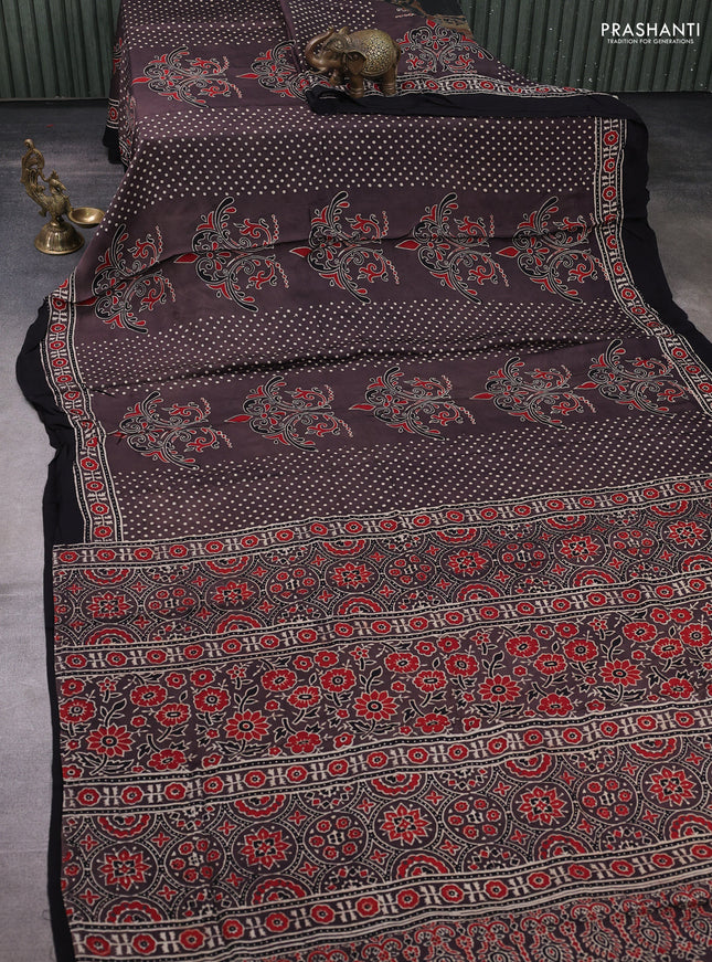 Modal silk saree rosy brown and black with allover ajrakh prints and printed border