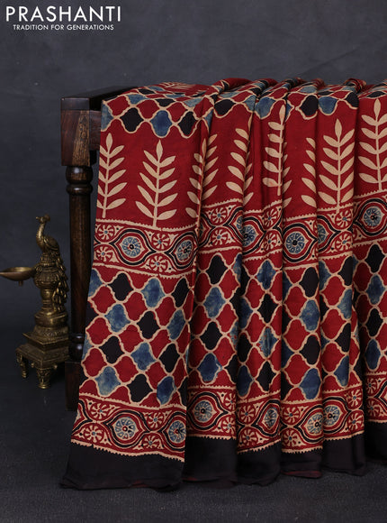Modal silk saree maroon and black with allover ajrakh prints and printed border