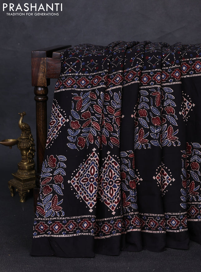 Modal silk saree black with allover ajrakh prints and printed border