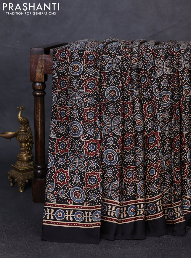 Modal silk saree black with allover ajrakh prints and printed border