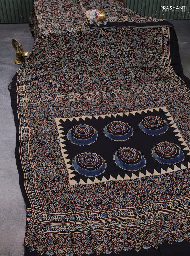 Modal silk saree black with allover ajrakh prints and printed border