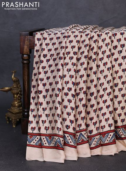 Modal silk saree beige with allover ajrakh prints and printed border