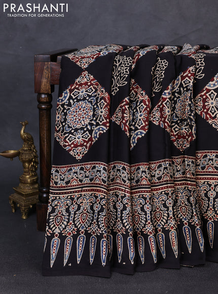 Modal silk saree black with allover ajrakh prints and printed border