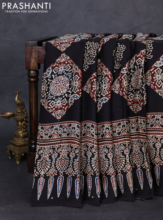 Modal silk saree black with allover ajrakh prints and printed border