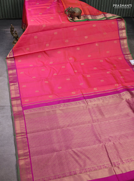 Pure kanchipuram silk saree dual tone pinkish orange and purple with allover vairaosi pattern & zari buttas and zari woven border