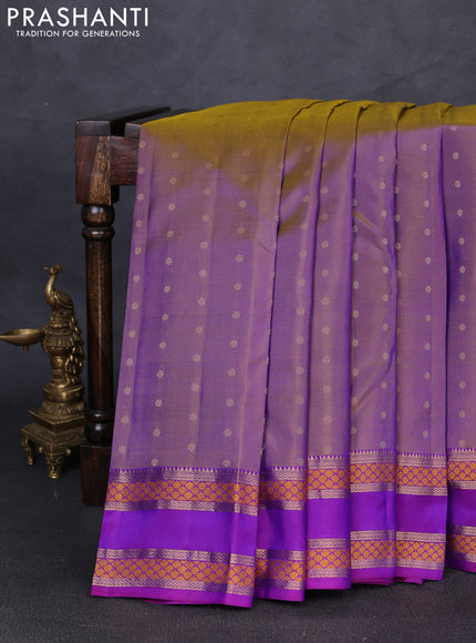 Pure kanchipuram silk saree dual tone purple and purple with allover zari woven buttas and rettapet zari woven border