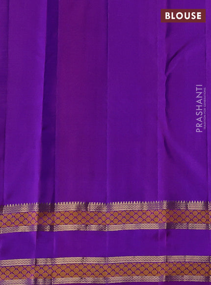 Pure kanchipuram silk saree dual tone purple and purple with allover zari woven buttas and rettapet zari woven border