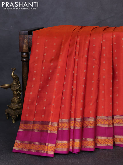 Pure kanchipuram silk saree rustic orange and purple with allover zari woven buttas and rettapet zari woven border