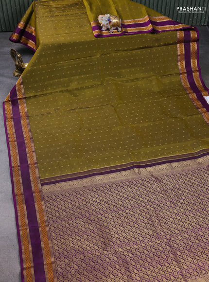 Pure kanchipuram silk saree mehendi green and purple with allover zari woven buttas and rettapet zari woven border