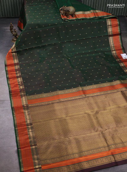 Pure kanchipuram silk saree bottle green and coffee brown with allover zari woven buttas and zari woven border