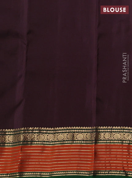 Pure kanchipuram silk saree bottle green and coffee brown with allover zari woven buttas and zari woven border