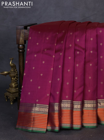 Pure kanchipuram silk saree dark magenta pink and purple with allover zari woven buttas and zari woven border