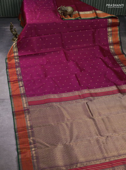 Pure kanchipuram silk saree dark magenta pink and purple with allover zari woven buttas and zari woven border