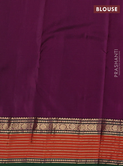 Pure kanchipuram silk saree dark magenta pink and purple with allover zari woven buttas and zari woven border