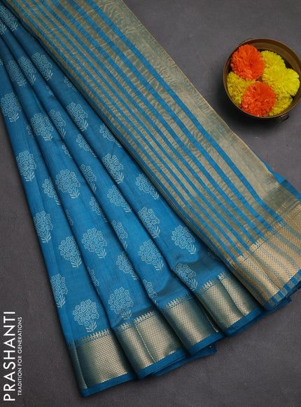Semi raw silk saree cs blue with allover butta prints and zari woven border