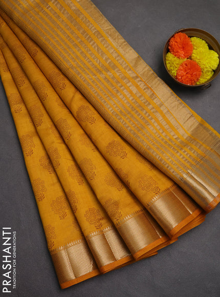 Semi raw silk saree mustard yellow with allover butta prints and zari woven border