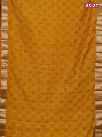 Semi raw silk saree mustard yellow with allover butta prints and zari woven border