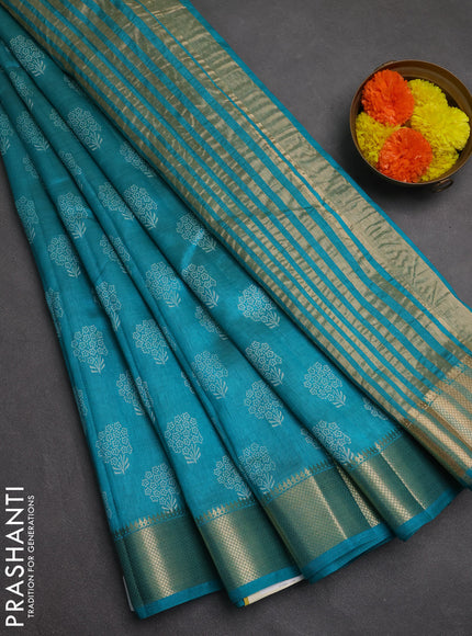 Semi raw silk saree teal blue with allover butta prints and zari woven border