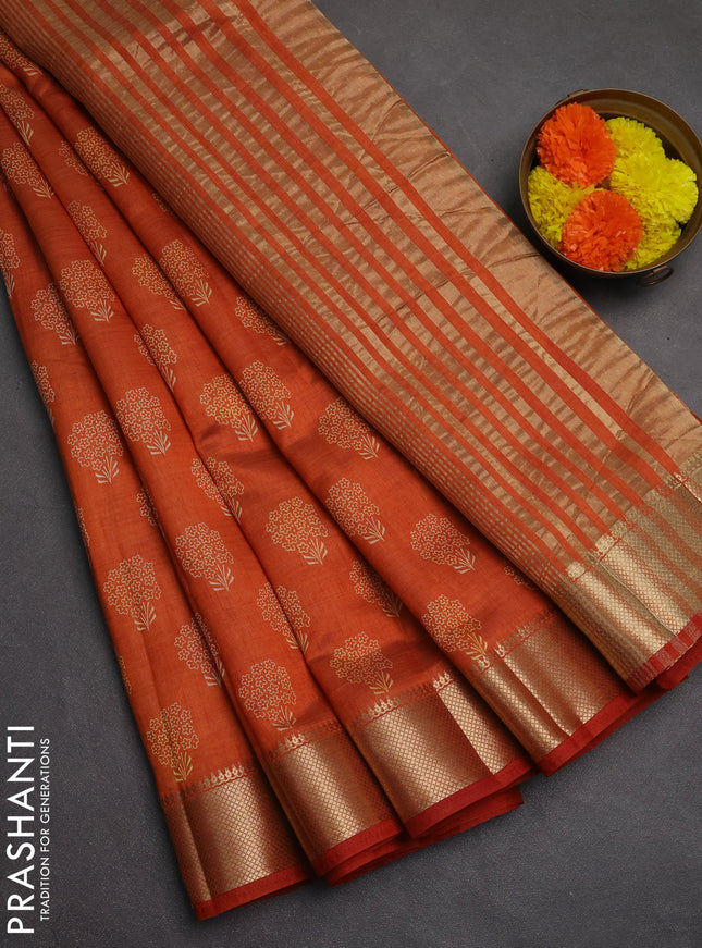 Semi raw silk saree rustic orange with allover butta prints and zari woven border