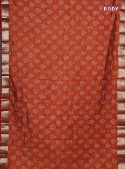 Semi raw silk saree rustic orange with allover butta prints and zari woven border