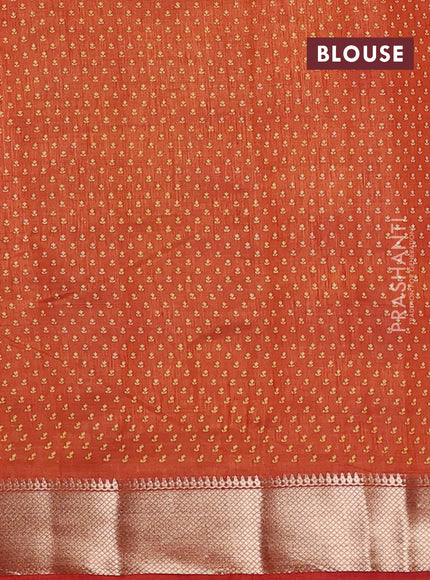 Semi raw silk saree rustic orange with allover butta prints and zari woven border