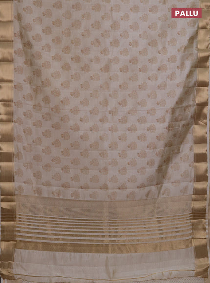 Semi raw silk saree cream with allover butta prints and zari woven border