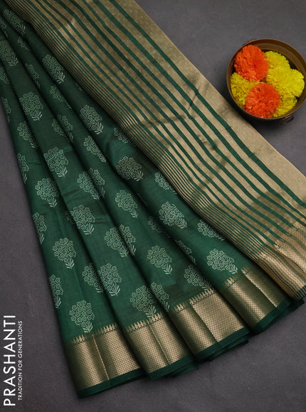 Semi raw silk saree bottle green with allover butta prints and zari woven border