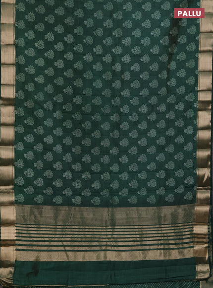 Semi raw silk saree bottle green with allover butta prints and zari woven border