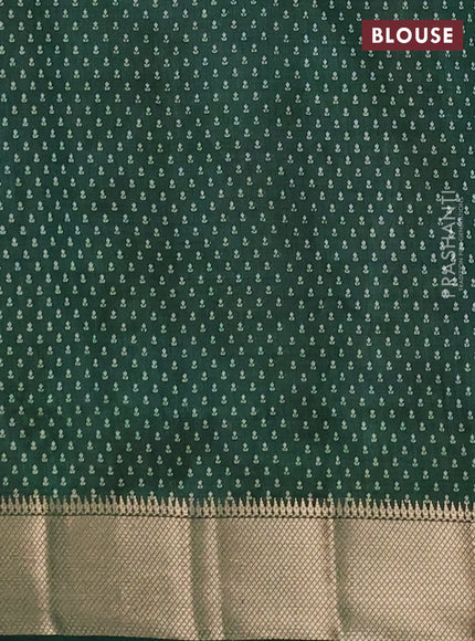 Semi raw silk saree bottle green with allover butta prints and zari woven border