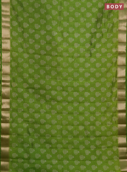 Semi raw silk saree light green with allover butta prints and zari woven border