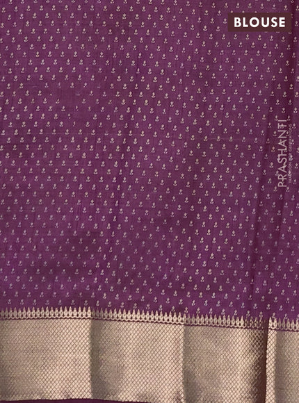 Semi raw silk saree purple with allover butta prints and zari woven border