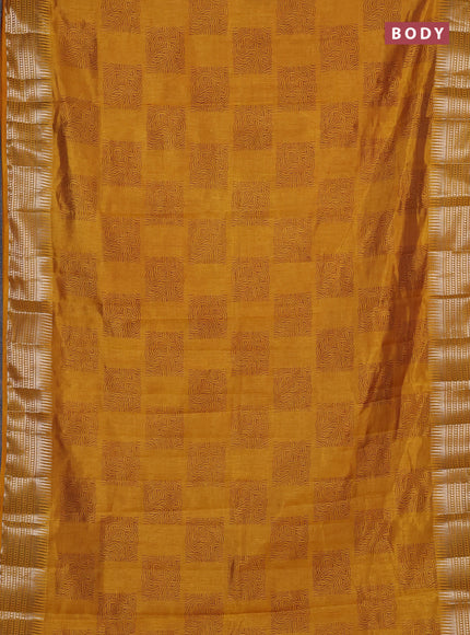 Semi raw silk saree mustard yellow with allover box type butta prints and zari woven border