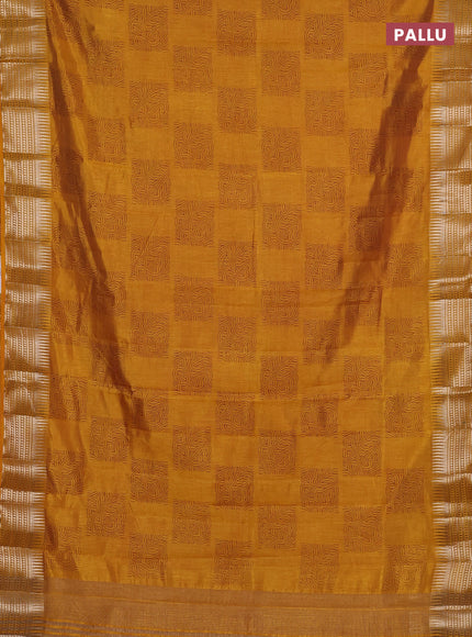 Semi raw silk saree mustard yellow with allover box type butta prints and zari woven border