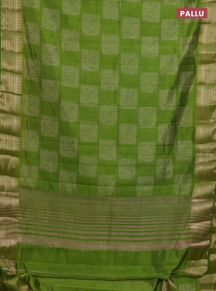 Semi raw silk saree light green with allover box type butta prints and zari woven border